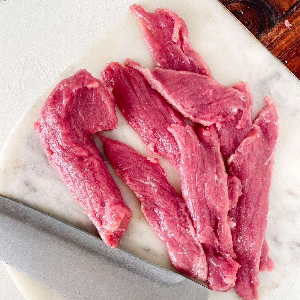 he key to this jerky is in the marinade. Beef sirloin tip steak provides a lean yet flavorful base, while a blend of soy sauce, Worcestershire sauce, brown sugar, and warming spices like cumin and paprika create a delicious balance of savory, sweet, and smoky.